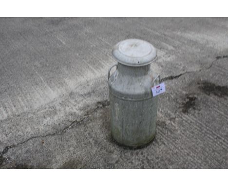 A galvanised metal milk churn and lid. Stamped 10 gallon Primrosse Maidstone, appears sound in base small crack to rim, H75cm