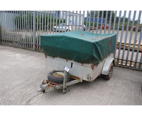 A Caddy box trailer. With tow hitch, metal floor appears sound, complete with canvas cover, hole in one side, H118cm x L290cm