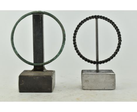 Two Viking and continental metal &amp; bronze bracelets bangles. The lot to include a bronze round continental bangle. Togeth