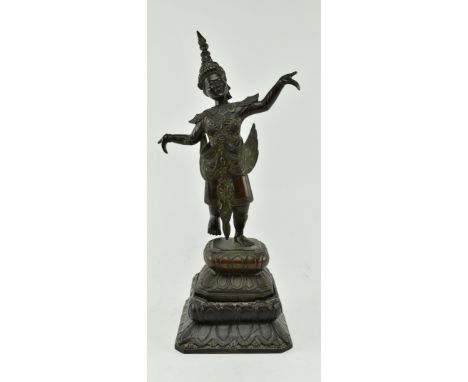 A early 20th century heavy bronze Apsara dancer swivel statue. The figurine dressed in traditional way with detailed headwear