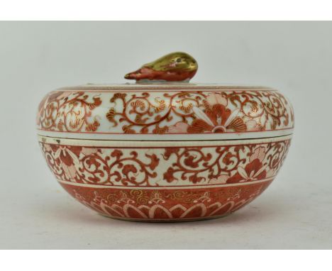 A 19th century Japanese Kutani hand-painted ceramic bowl with lid along with a golden finial. With birds and flowers on the h