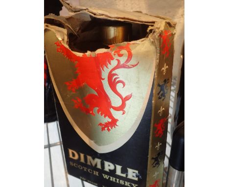 Vintage bottle of Dimple scotch whisky 70° proof 26 2/3 fl oz 