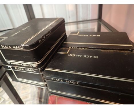 Four 1960s Black Magic chocolates tins 