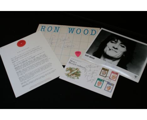 THE ROLLING STONES - RON WOOD/CHARLIE WATTS - a Ron Wood signed photo and envelope along with a Woody's Pecker plectrum, a Co