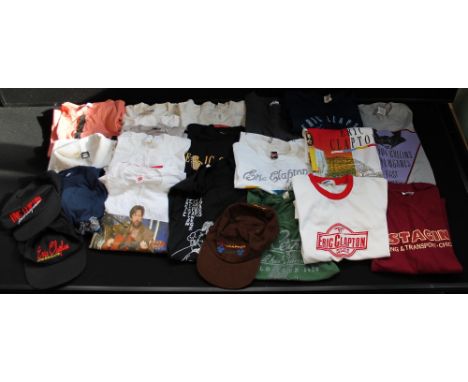 ERIC CLAPTON -  a selection of Eric Clapton t-shirts and baseball caps from his earlier tours and concerts to include a white