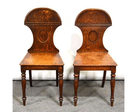 Pair of Victorian hall chairs, demi-lune crestings, solid seats, slender turned baluster legs, height 84cm.Qty: 2Condition re