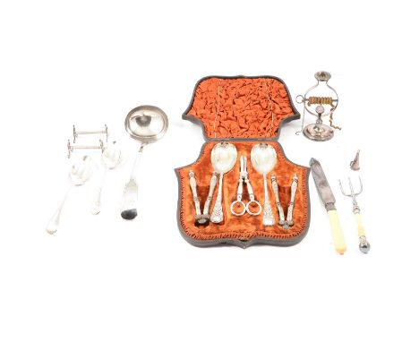 Victorian cased set of nutcrackers, grape scissors and berry spoons, a silver-plated wax jack, knife rests and soup ladle, br