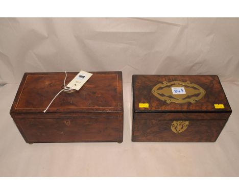 A Victorian burr walnut and brass mounted tea caddy; and a Victorian inlaid walnut tea caddy, brass handle to cover.  (2)