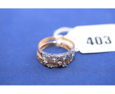 A 9ct. yellow gold pierced and diamond set ring, ring size Q; together with a light blue stone and diamond ring, on 9ct. yell