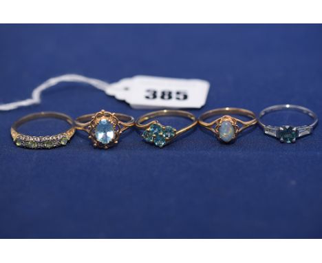 Gemstone set jewellery, to include: an opal triplet; topaz; peridot and diamond; and others, all in 9ct. gold mounts, ring si