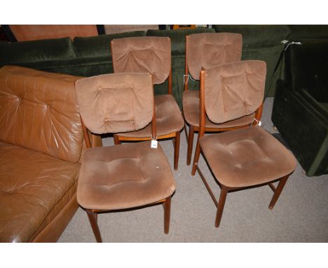 Four G-Plan style 1970's dining chairs, with teak frames, button upholstered backs and seats.