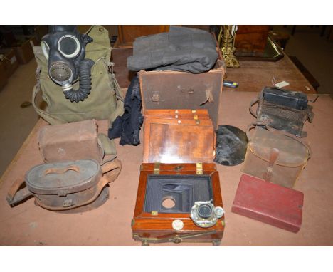 A collection of vintage cameras; including a folding plate camera by J. Lizars 'Challenge' model with Beck Symmetrical Lens; 