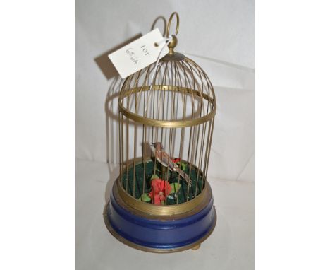 A 20th Century German singing bird cage automaton music box.