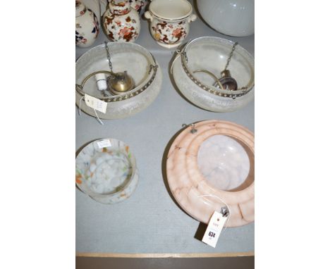 A pair of opaque glass ceiling lights; a pink glass ceiling light; and a glass shade.  (4)