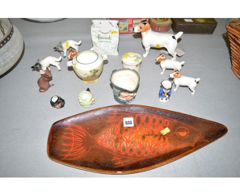 A Poole Aegean fish pattern dish, no. 82; Beswick terrier and three pups; Royal Doulton two-handled vase; a Harrods Food Hall