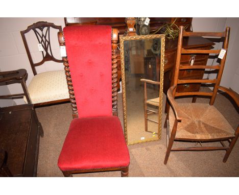 A 19th Century button back prie dieu chair, with carved spiral back and red velvet upholstery, raised on turned legs and bras