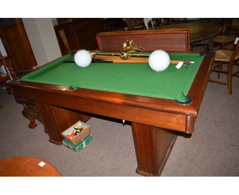 A modern mahogany pool table/extending dining table, with balls, cues and a light fitting, scoreboard to underside of one lea