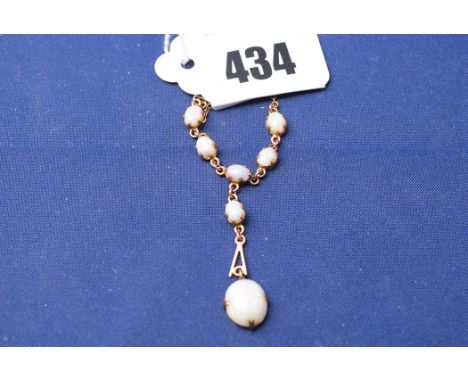 An opal necklace, set with oval cabochon drop, on fine link chain.