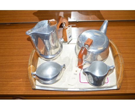 A Picquot ware aluminium five-piece tea set, comprising: teapot, hot water jug, cream, sugar and tray.