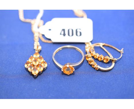 Citrine set jewellery, to include: a drop pendant on chain; a pair of earrings; and a single stone ring, ring size R, all mou