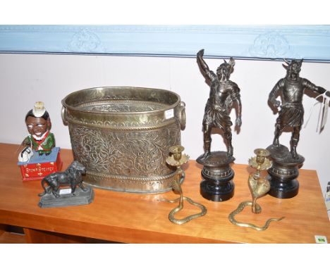 A 'Stump Speaker' painted metal money bank; a pair of Viking spelter figures; cast metal figure of a lion; a pair of brass ca