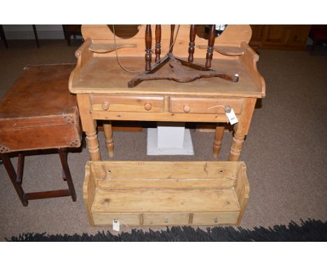 A pitch pine washstand, two frieze drawers; and a stripped pine wall mounted shelf unit fitted three drawers.  (2)