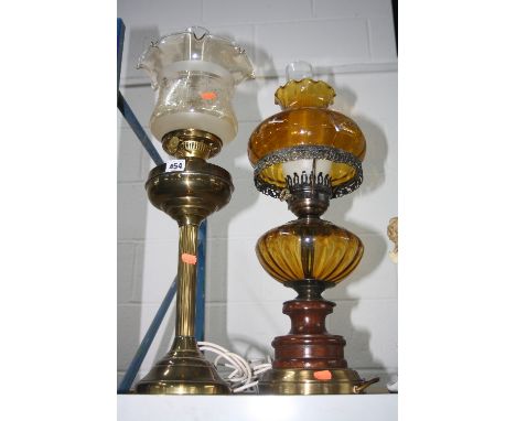 A BRASS OIL LAMP, with glass shade and another lamp (electric) (2)