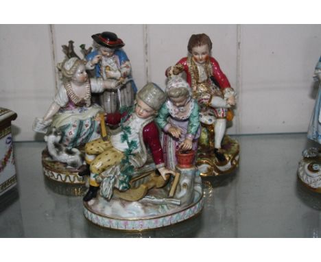TWO MEISSEN PORCELAIN FIGURE GROUPS, modelled as couple picking fruit on naturalistic base with gilt highlights, blue cross s