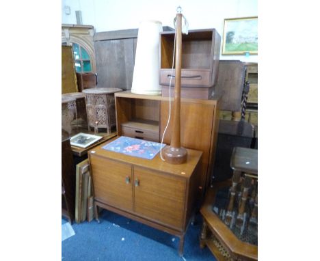 A QUANTITY OF 1970'S TEAK FURNITURE, including a two door cabinet and a standard lamp with shade (4)