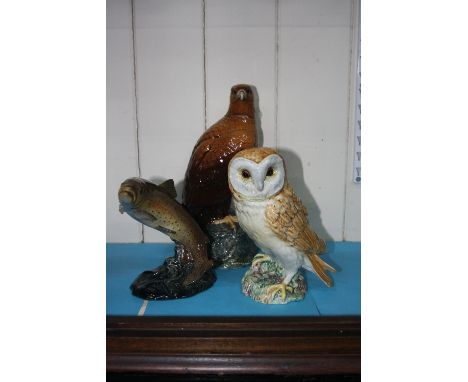 A BESWICK TROUT, No.1032, a Beswick Barn Owl No.1046 and a Doulton Golden Eagle whisky flask (3)