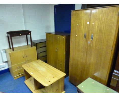 A TEAK TWO DOOR WARDROBE, similar gentleman's wardrobe, chest of four drawers, tallboy and a stool (5)