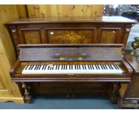AN F RUBENSTEIN &amp; CO WALNUT CASED UPRIGHT PIANO, together with a piano stool containing sheet music