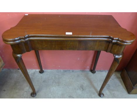 An George III Irish mahogany fold over games table, by R. Strahan &amp; Co Ltd, 135 St Stephen's Green, Dublin 