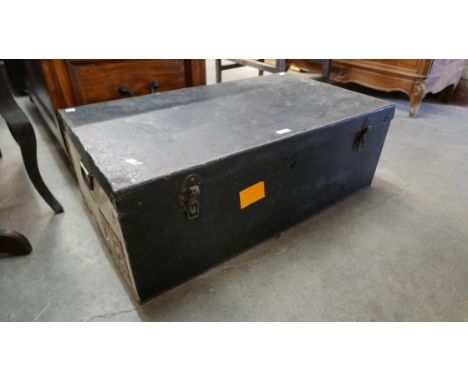 A tin trunk 