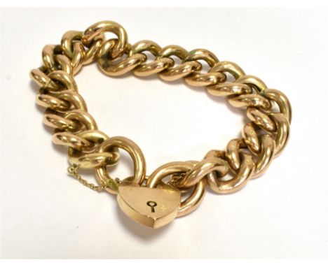A STAMPED 9CT ROSE METAL CURB LINK  BRACELET  With stamped 9.375 Birmingham Heart padlock with safety chain weight approx 31g