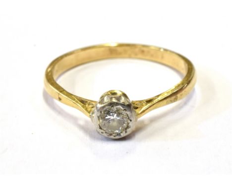 18CT GOLD &amp;  DIAMOND SOLITAIRE A platinum illusion set round brilliant cut diamond, estimated 0.20 carats, of good qualit