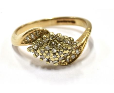 GOLD &amp; DIAMOND SET CLUSTER RING  In 9ct gold with a central navette shaped cluster, grain set with single cut diamonds an