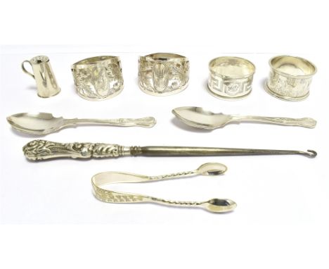 A COLLECTION OF SILVER and EPNS Comprising a matched pair of silver napkins rings,&nbsp;and two other non-matching silver nap