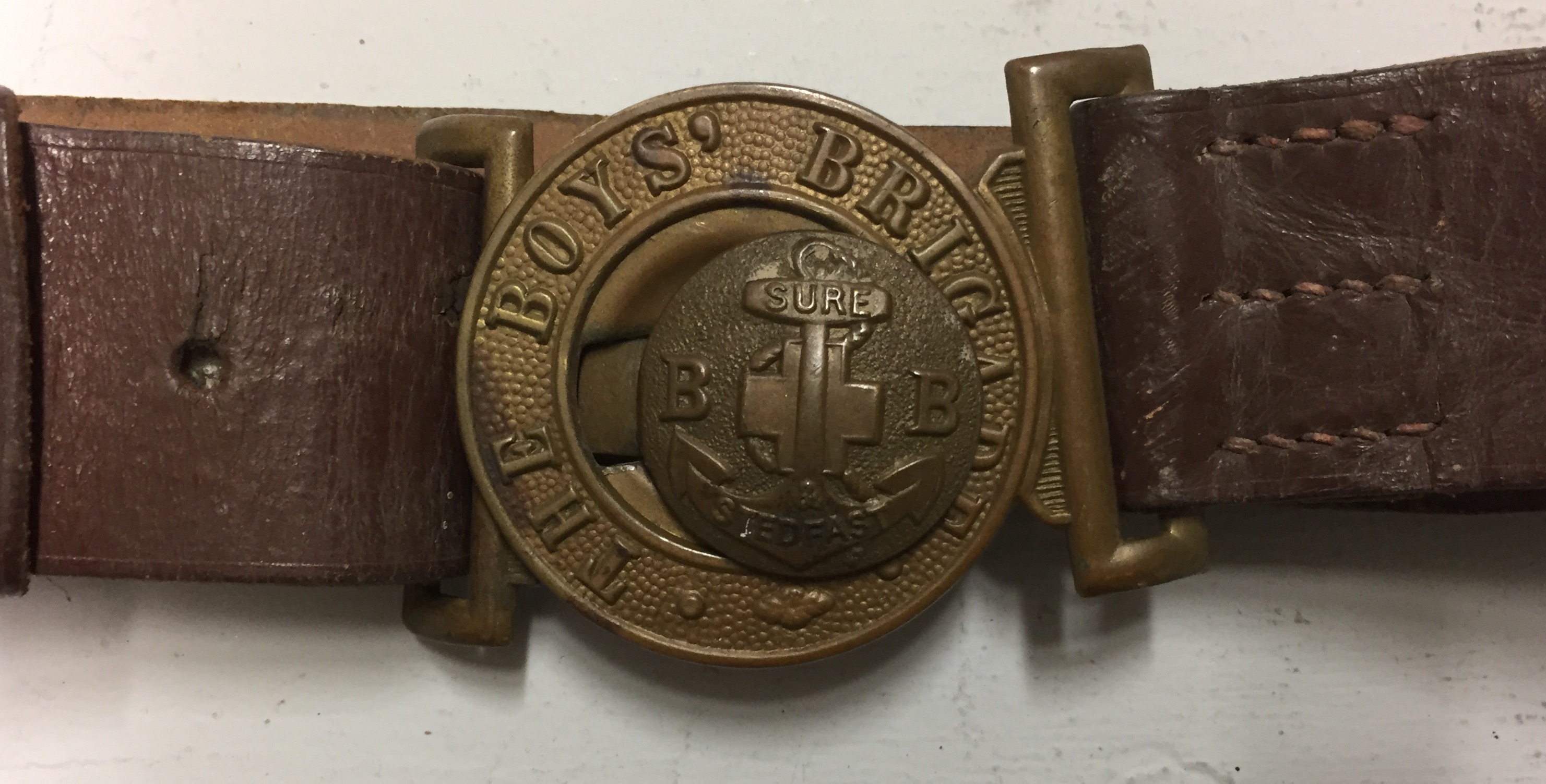 A COLLECTION OF WHISTLES AND BOYS BRIGADE BELTS.