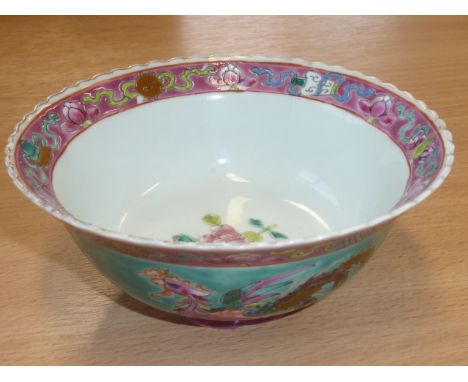 A Chinese porcelain Bowl hand decorated in enamel in the Famille Rose palette in 18th century style (20th century), the inter