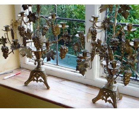 A pair of late 19th/early 20th century (probably French) seven-light Table Candelabra modelled as fruiting vine and barley et