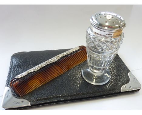 A George IV silver topped cut glass Sander, London 1818 together with a gentleman's silver mounted leather Wallet, Birmingham