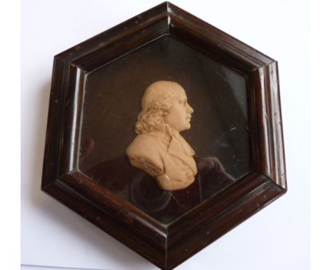 An hexagonal framed 18th century Wax Portrait miniature "Alex Waugh A.M., WELLS STREET, LONDON 1794" by James Tassie, signed,