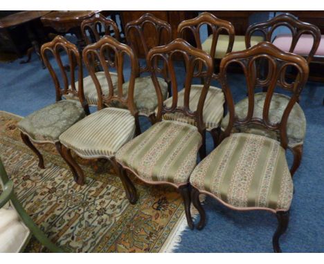 A good set of eight mid-19th century rosewood Salon Chairs, each with arched toprail above three further pierced arches and o