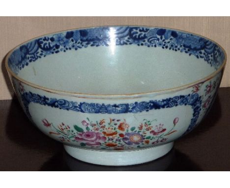 An 18th century Chinese porcelain Bowl delicately decorated in the Famille Rose palette with floral sprays between similar un