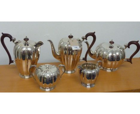 An extremely fine five-piece heavy solid silver Tea/Coffee Service by Elkington & Co., comprising melon-shaped Teapot, Coffee