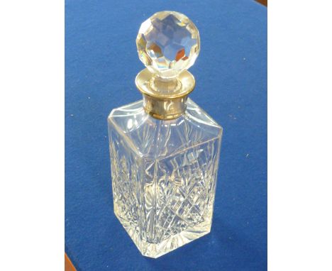 A fine cut crystal Spirit Decanter having a mounted hallmarked silver collar, makers mark G & Co. LD., (possibly Garrard & Co