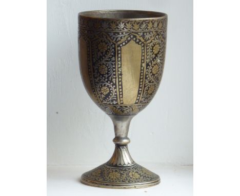A late 19th/early 20th century Islamic/Indian style silvered brass Goblet, five vertical panels with Moorish style pediments 