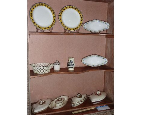 A selection of mostly late 18th century Creamware to include lidded quadrant Hors d'oeuvre Dishes, lattice work Chestnut Bask