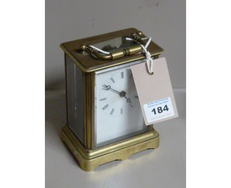 An early 20th century brass and glass cased Carriage Clock, French movement and white enamel dial with Roman numerals, 13.5cm